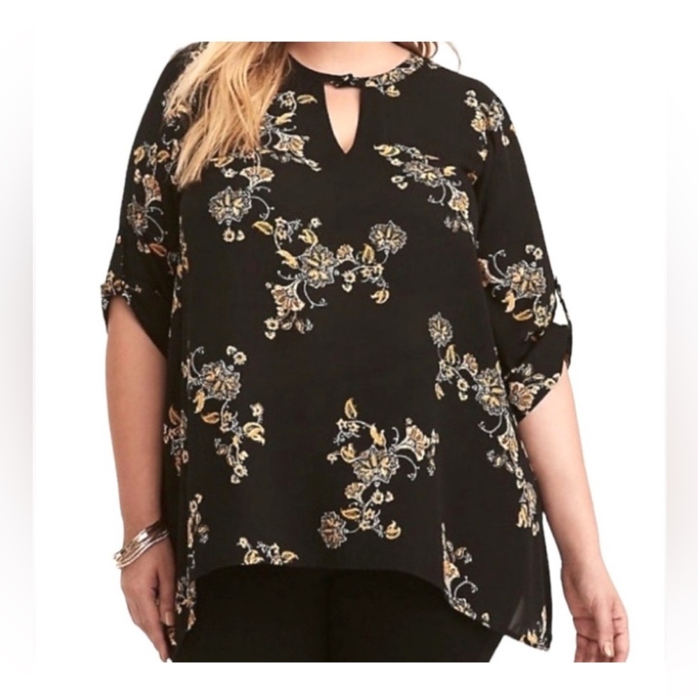 Torrid: Handkerchief Hem Tunic with Keyhole Neckline.